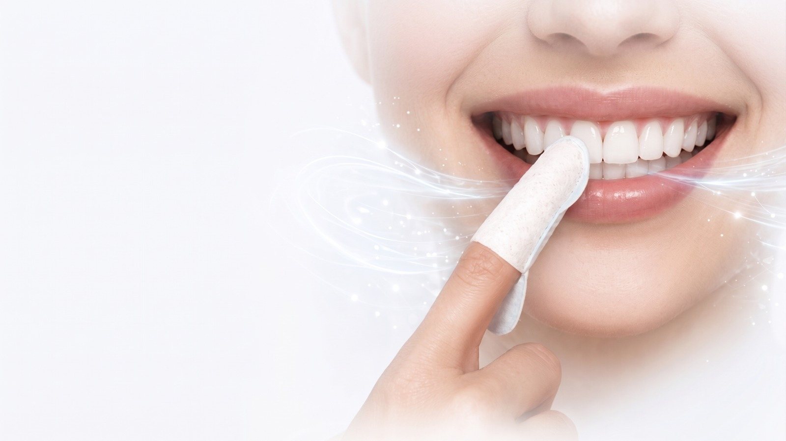 A smile with a finger wipe on the teeth
